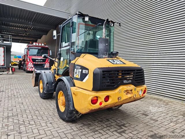 Колісний навантажувач Caterpillar 907 H Bucket + Forks!