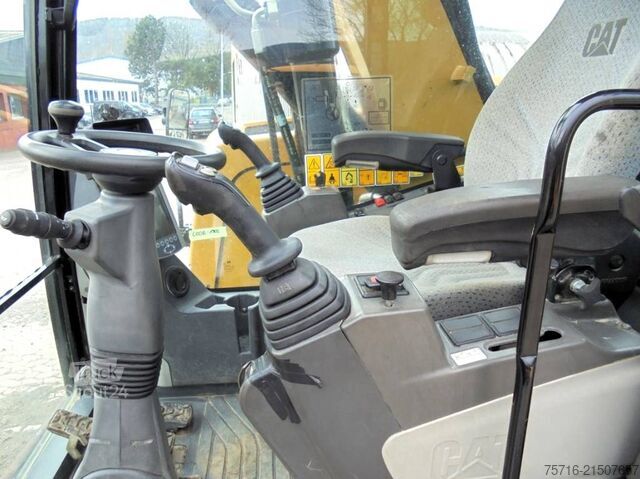 Колесен багер Caterpillar M 317 F