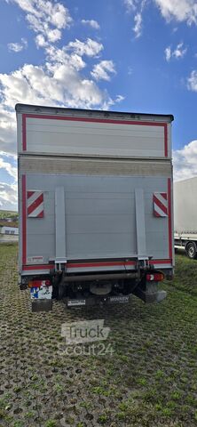 Transporteris su plokščia platforma ir brezentu Iveco EuroCargo 75