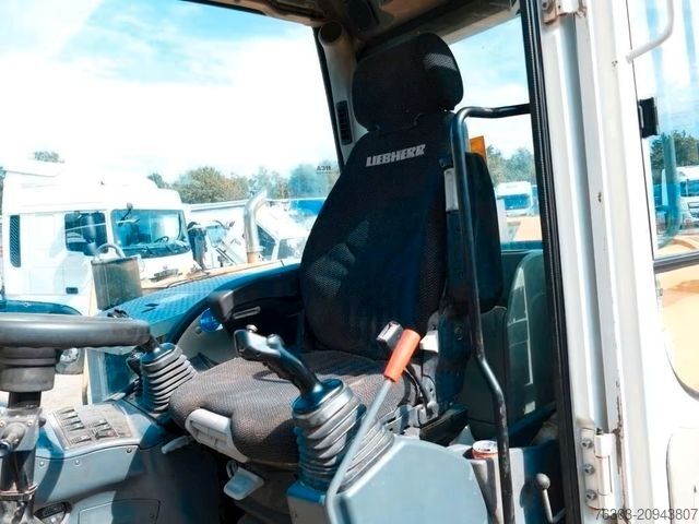 Pelle sur pneus LIEBHERR A311 Litronic