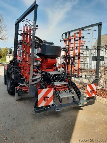 Cultivador de campo Grünlandstriegel mit Drillstar