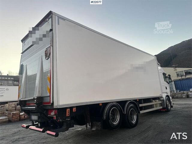 Box body Scania G480 6x2 box truck with full side opening.