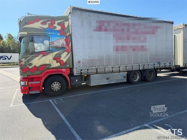 Συρόμενος μουσαμάς Scania R520 6x2 box truck with a 2-axle Schmitz Cargobull