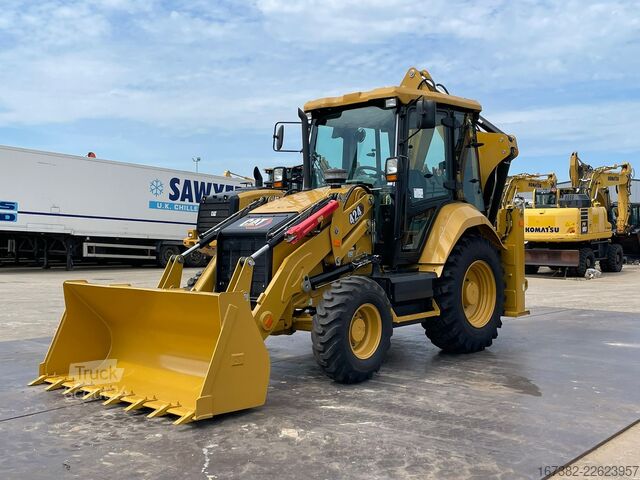 Kombination af gravemaskine og læsser Caterpillar 424