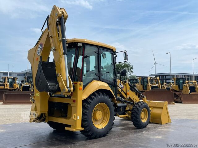 Kombination af gravemaskine og læsser Caterpillar 424
