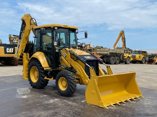Kombination af gravemaskine og læsser Caterpillar 424