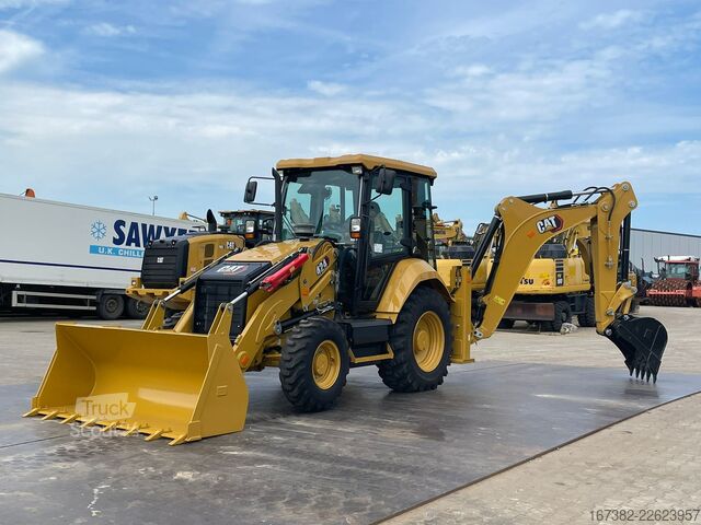 Kombination af gravemaskine og læsser Caterpillar 424