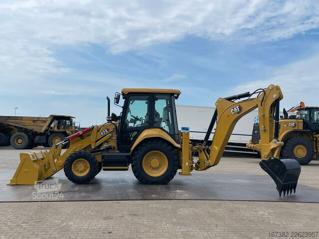 Kombination af gravemaskine og læsser Caterpillar 424
