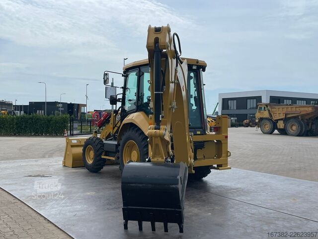 Kombination af gravemaskine og læsser Caterpillar 424