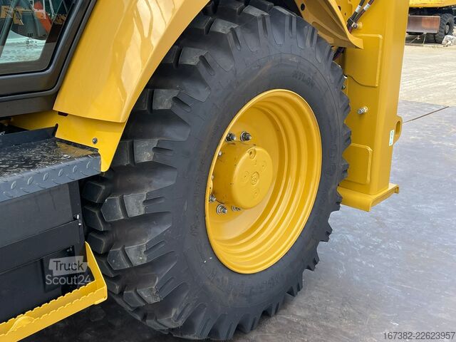 Kombination af gravemaskine og læsser Caterpillar 424