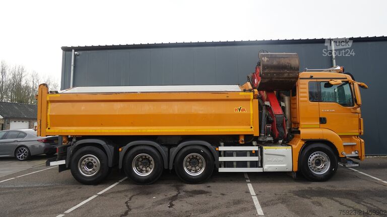 شاحنة رافعة MAN TGS 35.440 8X4 2 SIDE TIPPER WITH HMF Z 1943 CR...
