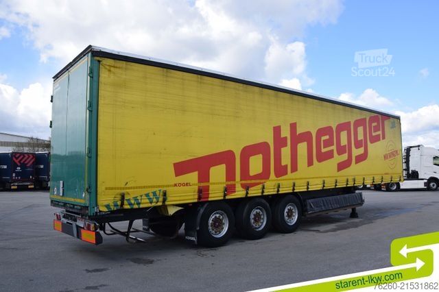Open semitrailer with tarp KÖGEL Tautliner Palettenkasten Lochrahmen SAF Achsen