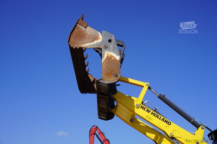 Graaaflaadmachine New Holland B 115 C backhoe loader / 1000 MTH !