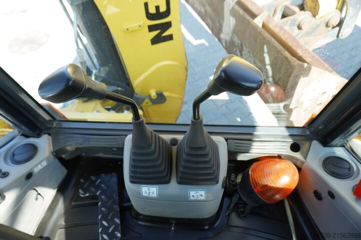 Graaaflaadmachine New Holland B 115 C backhoe loader / 1000 MTH !