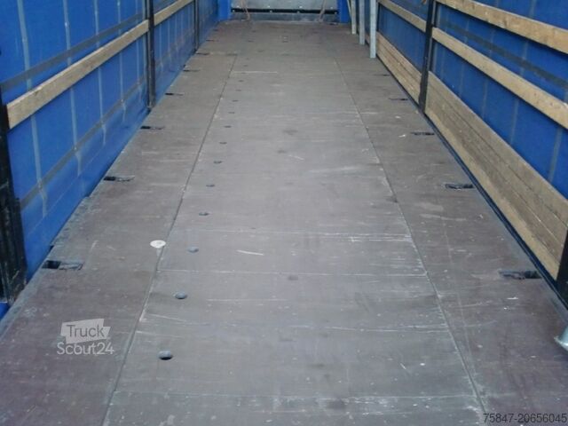 Pótkocsi platóval és ponyvával Krone SDP 27 Coil 8.600 bahnverladbar