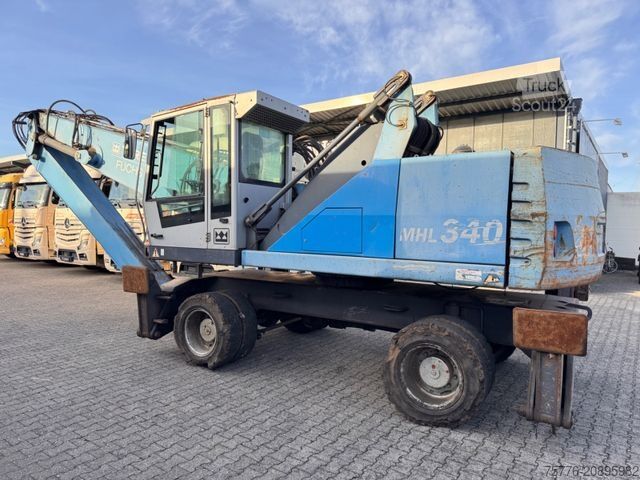 Pelle sur pneus FUCHS Terex MHL 340 Umschlagbagger Magnet