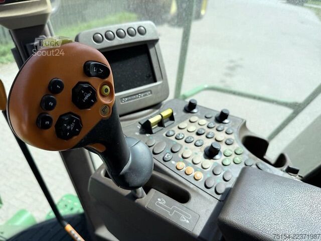 Комбайн John Deere W540 mit Raspvorsatz