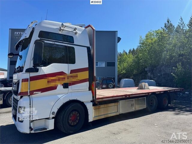 Платформенный трейлер MAN TGX 580 Flatbed truck.