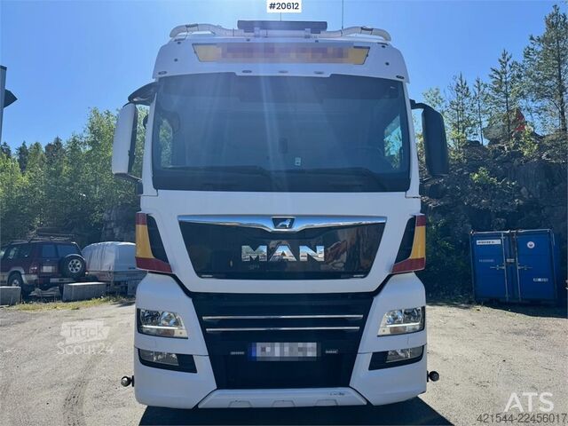 Платформенный трейлер MAN TGX 580 Flatbed truck.