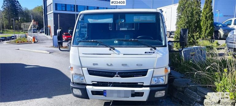 Платформенный трейлер Mitsubishi Fuso Canter 4x2 flatbed truck for sale as a repair