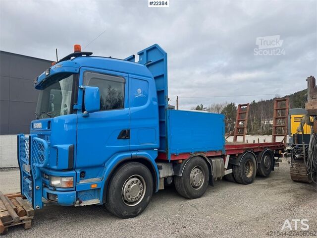 Платформенный трейлер Scania R480 flatbed truck with manual loading ramps - rep