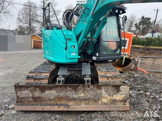 Grävmaskin med larvband Kobelco SK140SRLC-7 crawler excavator with extensive equip