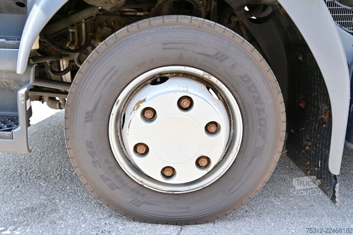 Kamion sa ravnom platformom i ceradom Renault D12.240  E6 LBW Bett Telma Blatt Luft Scheckheft