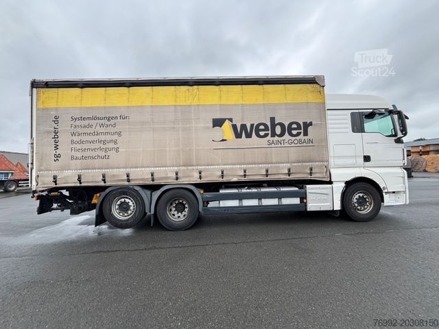 Flatbed truck with tarp MAN TGX 26.480 mit Ladebordwand