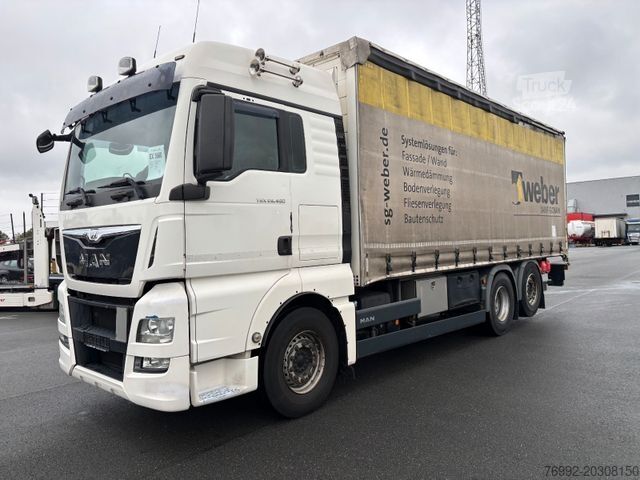 Tenteli düz yataklı kamyon MAN TGX 26.480 mit Ladebordwand