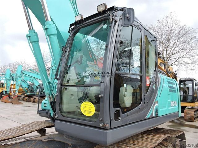 Excavatrice à chaînes KOBELCO SK210