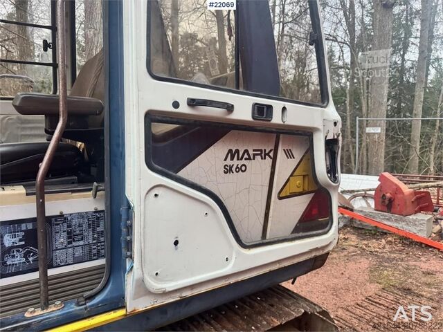 Pelle sur chenilles Kobelco SK60 crawler excavator with bucket