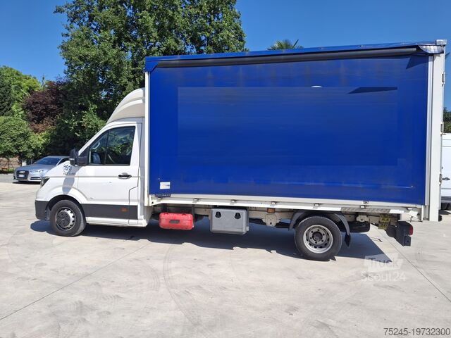 Furgoneta con lona corredera MAN TGE 3.180