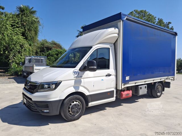 Furgoneta con lona corredera MAN TGE 3.180