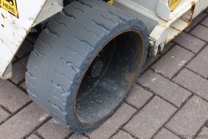 Scissor lift Holland Lift Ecostar HL-9710 Electric, 12m Working Height, 325k