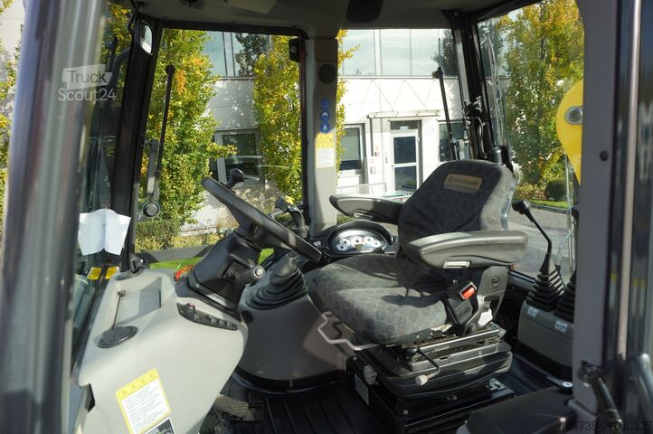 Graaflaadmachine New Holland B 115 C backhoe loader / 1000 MTH !