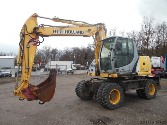 Escavatore gommato NEW HOLLAND WE 150