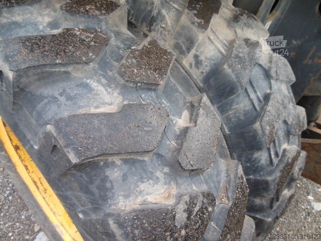 Escavatore gommato NEW HOLLAND WE 150