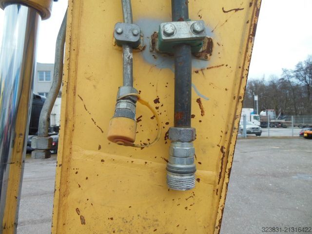 Escavatore gommato NEW HOLLAND WE 150