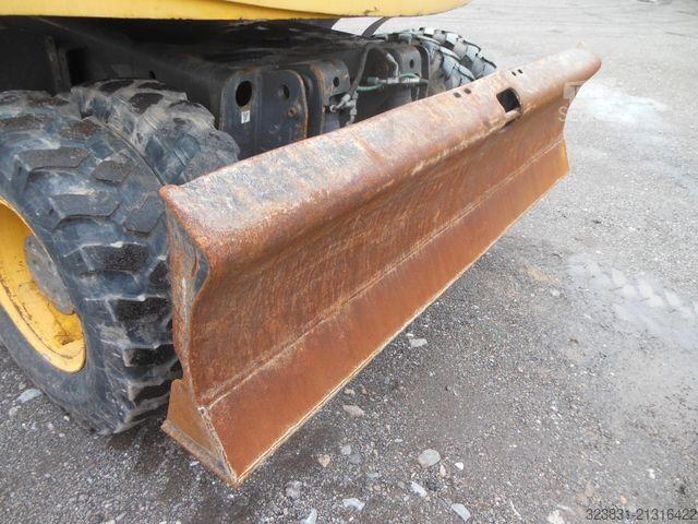 Escavatore gommato NEW HOLLAND WE 150