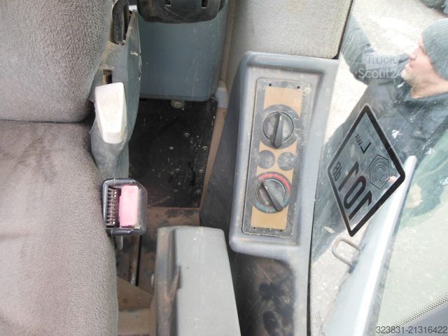 Escavatore gommato NEW HOLLAND WE 150