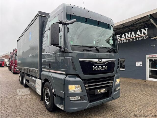Камион платформа с брезент MAN 26.470 XXL TGX  Mitnahmestapler Moffett M4 NX