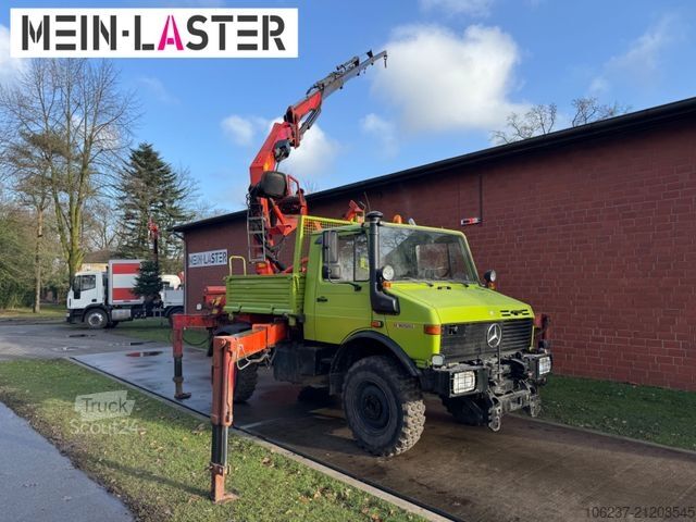 Teherautóra szerelt daru UNIMOG U 1650 PK 10500 Kran 15 m max. 3,9 t Seilwinde