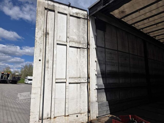 Semiremorcă deschisă cu prelată KRONE Gardine Lowliner, Joloda-Schienen, Hubdach