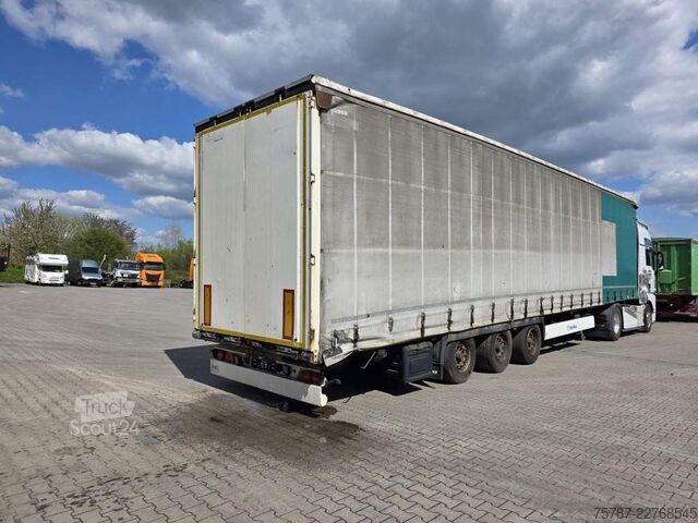 Semiremorcă deschisă cu prelată KRONE Gardine Lowliner, Joloda-Schienen, Hubdach
