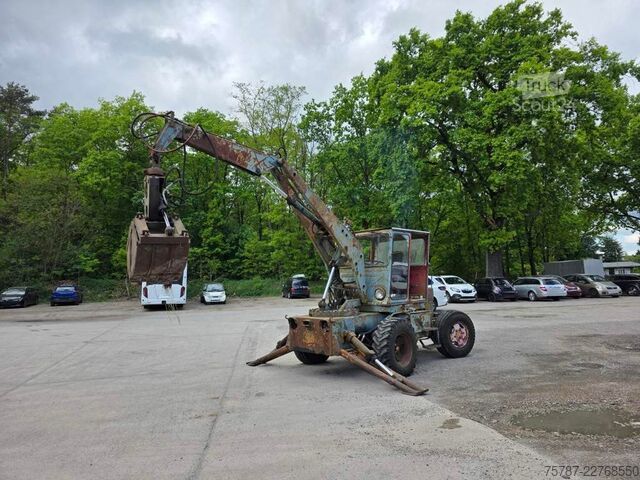 Excavator pe roți  Craiova IH Radbagger ( Romania ) mit 2 Schalengr