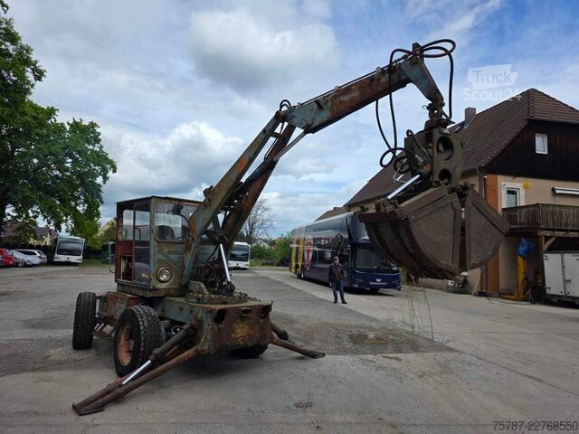 Excavator pe roți  Craiova IH Radbagger ( Romania ) mit 2 Schalengr