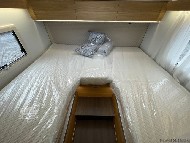 Teilintegriertes Wohnmobil GLUECKSMOBIL S 72DL *Hubbett*Face-to-Face