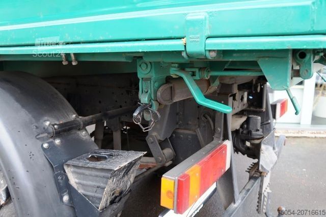 Трехсторонний самосвал MAN 7731