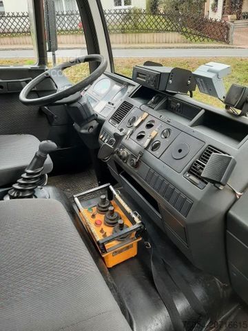 Трехсторонний самосвал MAN 7731