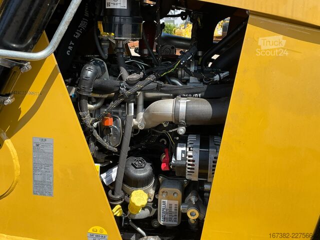 Kombinasjon av gravemaskin/lastemaskin Caterpillar 424
